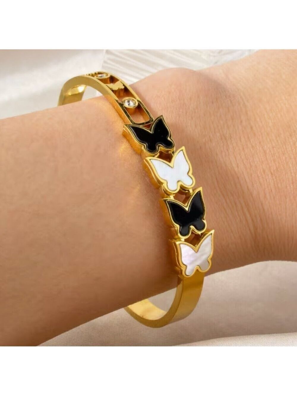 Exquisite Geometric Black and White Butterfly-Accented Stainless Steel Bracelet